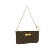 Louis Vuitton Vintage Pre-owned Canvas axelremsvskor Brown, Dam