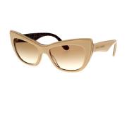 Dolce & Gabbana Leopardmönstrade Cat-Eye Solglasögon Beige, Dam