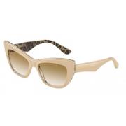 Dolce & Gabbana Stiliga solglasögon för modemedvetna kvinnor Beige, Da...
