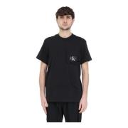 Calvin Klein Jeans Svarta T-shirts och Polos med Vit Logotyp Black, He...
