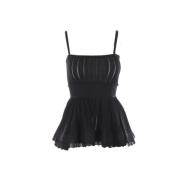 Alaïa Svart Ribbstickad Peplum Topp Black, Dam