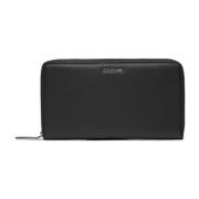 Calvin Klein Svart dragkedja plånbok i polyester-polyuretan Black, Dam