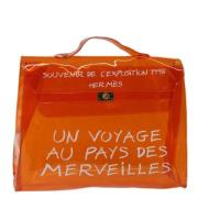 Hermès Vintage Pre-owned Vinyl handvskor Orange, Dam