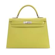 Hermès Vintage Pre-owned Laeder handvskor Yellow, Dam