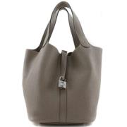 Hermès Vintage Pre-owned Tyg handvskor Beige, Dam