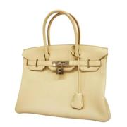 Hermès Vintage Pre-owned Tyg handvskor Beige, Dam