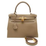 Hermès Vintage Pre-owned Tyg handvskor Beige, Dam