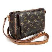 Louis Vuitton Vintage Pre-owned Canvas axelremsvskor Brown, Dam