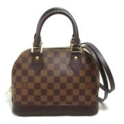 Louis Vuitton Vintage Pre-owned Canvas handvskor Brown, Dam