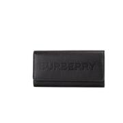 Burberry Svart Kornigt Läder Logotyp Präglad Clutch Plånbok Black, Dam