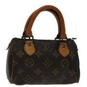 Louis Vuitton Vintage Pre-owned Canvas handvskor Brown, Dam