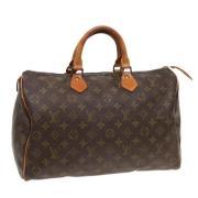 Louis Vuitton Vintage Pre-owned Canvas handvskor Brown, Dam