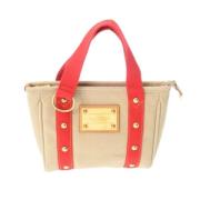 Louis Vuitton Vintage Pre-owned Canvas handvskor Beige, Dam