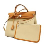 Hermès Vintage Pre-owned Tyg handvskor Beige, Dam