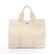 Hermès Vintage Pre-owned Canvas handvskor Beige, Dam