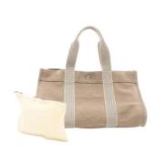 Hermès Vintage Pre-owned Canvas handvskor Beige, Dam