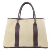 Hermès Vintage Pre-owned Canvas handvskor Beige, Dam