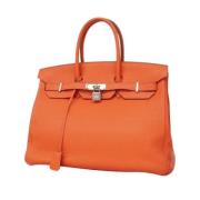 Hermès Vintage Pre-owned Laeder handvskor Orange, Dam