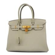 Hermès Vintage Pre-owned Laeder handvskor Beige, Dam