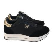 Love Moschino Svarta platta sneakers med mockadetaljer Black, Dam