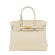 Hermès Vintage Pre-owned Laeder handvskor Beige, Dam