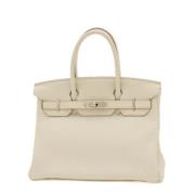 Hermès Vintage Pre-owned Laeder handvskor Beige, Dam