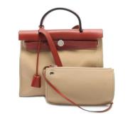 Hermès Vintage Pre-owned Canvas axelremsvskor Beige, Dam