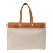 Hermès Vintage Pre-owned Canvas handvskor Beige, Dam