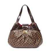 Louis Vuitton Vintage Pre-owned Belagd canvas axelremsvskor Brown, Dam