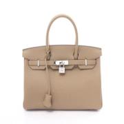 Hermès Vintage Pre-owned Laeder handvskor Beige, Dam