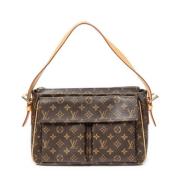 Louis Vuitton Vintage Pre-owned Belagd canvas axelremsvskor Brown, Dam