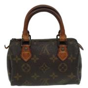 Louis Vuitton Vintage Pre-owned Canvas handvskor Brown, Dam