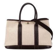 Hermès Vintage Pre-owned Canvas handvskor Beige, Dam