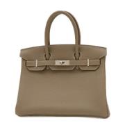 Hermès Vintage Pre-owned Laeder handvskor Beige, Dam