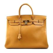 Hermès Vintage Pre-owned Laeder handvskor Beige, Dam