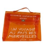 Hermès Vintage Pre-owned Vinyl handvskor Orange, Dam