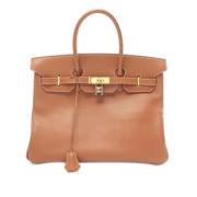 Hermès Vintage Pre-owned Laeder handvskor Brown, Dam