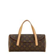 Louis Vuitton Vintage Pre-owned Canvas handvskor Brown, Dam