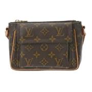 Louis Vuitton Vintage Pre-owned Canvas axelremsvskor Brown, Dam