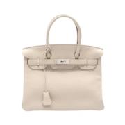 Hermès Vintage Pre-owned Laeder handvskor Beige, Dam