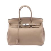 Hermès Vintage Pre-owned Laeder handvskor Beige, Dam