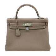 Hermès Vintage Pre-owned Laeder handvskor Beige, Dam