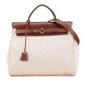 Hermès Vintage Pre-owned Canvas handvskor Brown, Dam