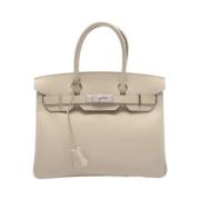 Hermès Vintage Pre-owned Tyg handvskor Beige, Dam