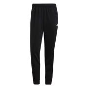 Adidas Essentials Warm-Up Tapered 3-Stripes Långa byxor Black, Herr