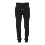 Balmain Svarta bomulls sweatpants med präglat Paris-logotyp. Black, He...