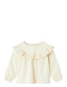 Lil'Atelier Nmfsaku Ls Loose Emb Top 2511-Ku S Lil Beige